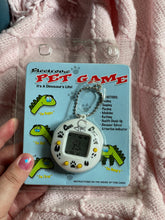 Load image into Gallery viewer, Electronic Dino Pet Game toy - late 90s / early 2000’s
